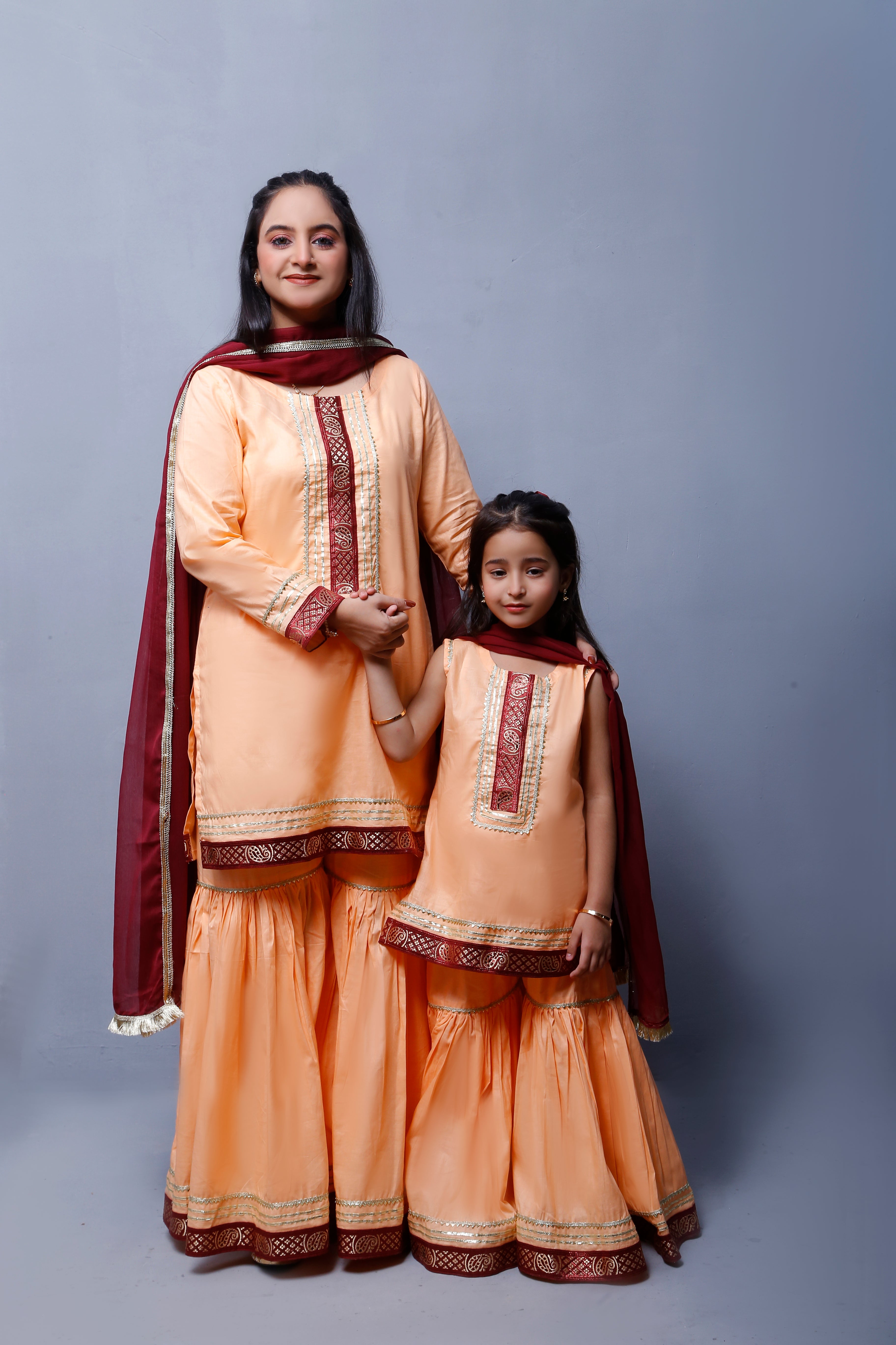 3 piece Elegant Peach Cotton Sleeveless Gharara Suit with Maroon & Golden Laces with Maroon Chiffon Dupatta.(Stitch)