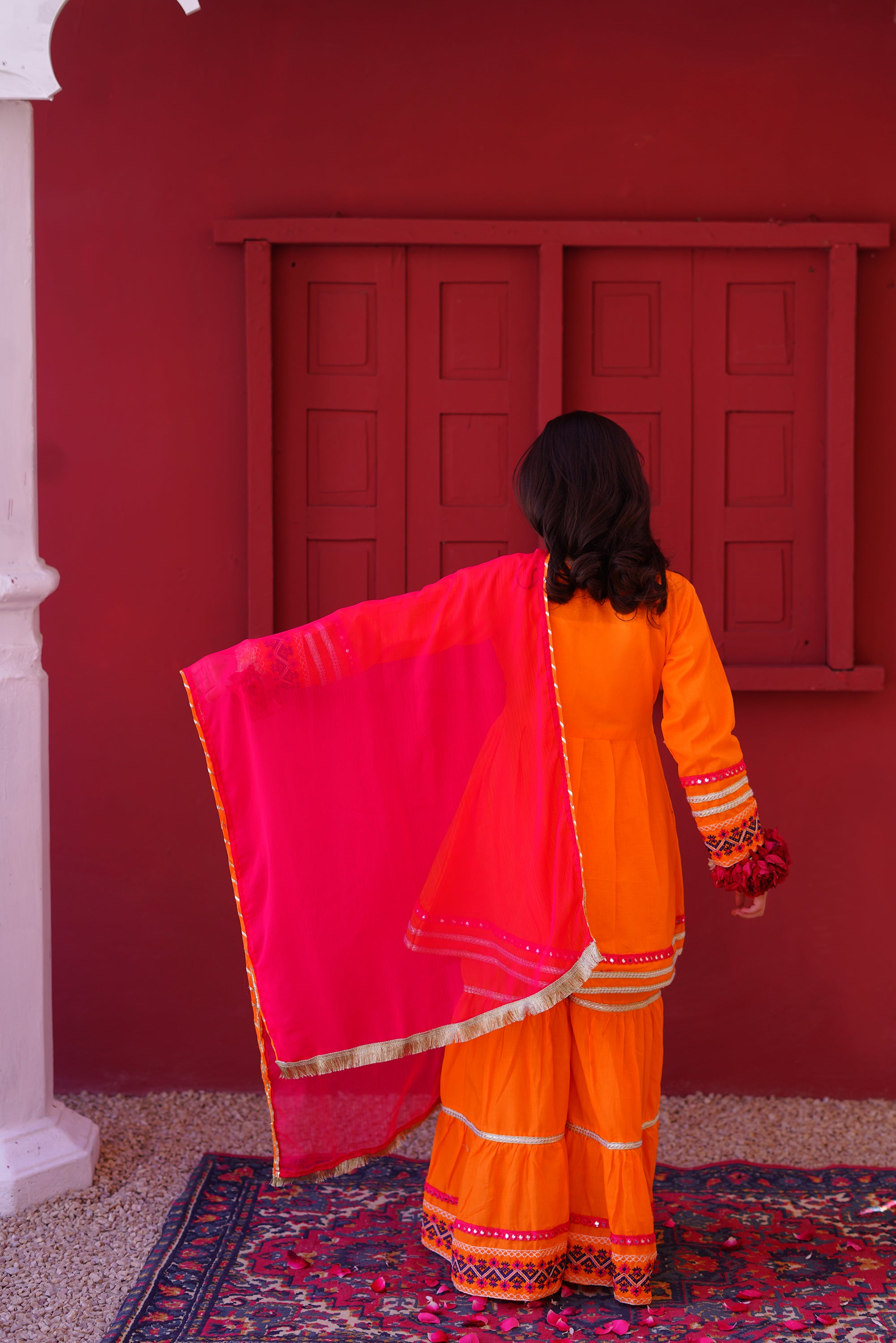 3 piece Orange Embroidered Cotton Peplum Frock Gharara Suit with Shocking Pink Chiffon Dupatta & Laces.(Stitch)