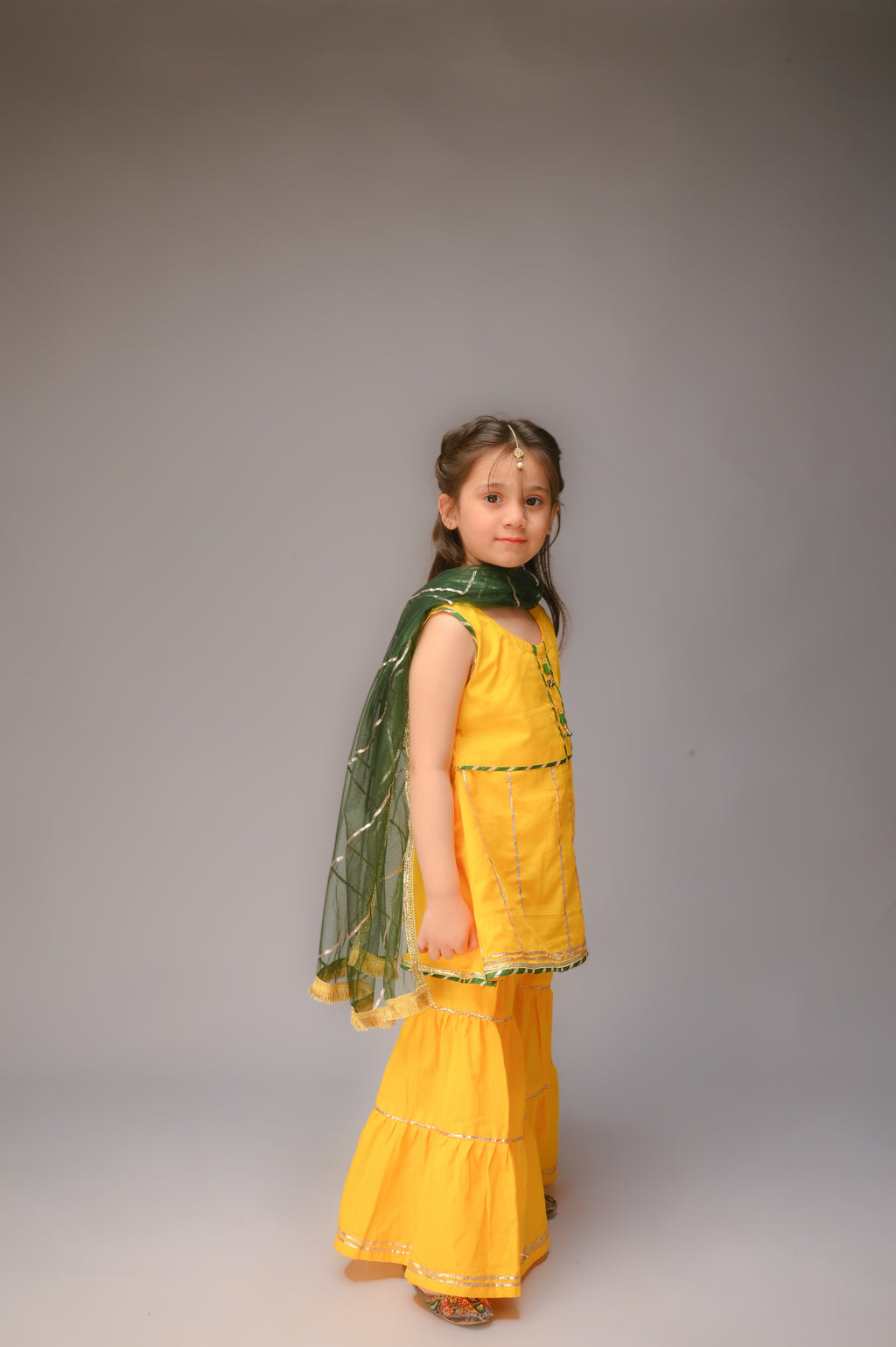 3 piece Yellow Cotton Sleeveless Gharara Suit with Bottle Green net Dupatta & Bottle Green & Golden Laces.(Stitch)