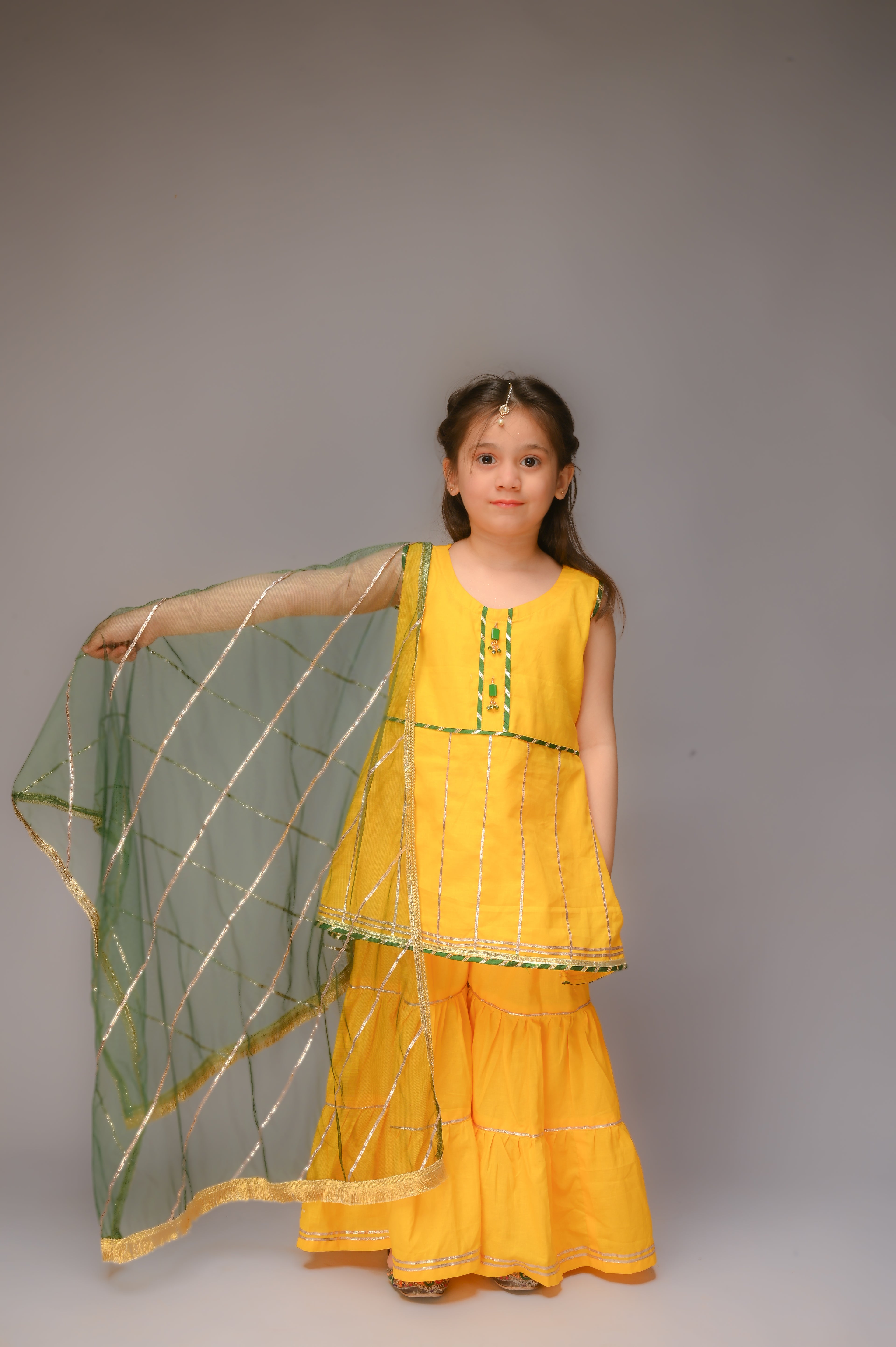 3 piece Yellow Cotton Sleeveless Gharara Suit with Bottle Green net Dupatta & Bottle Green & Golden Laces.(Stitch)