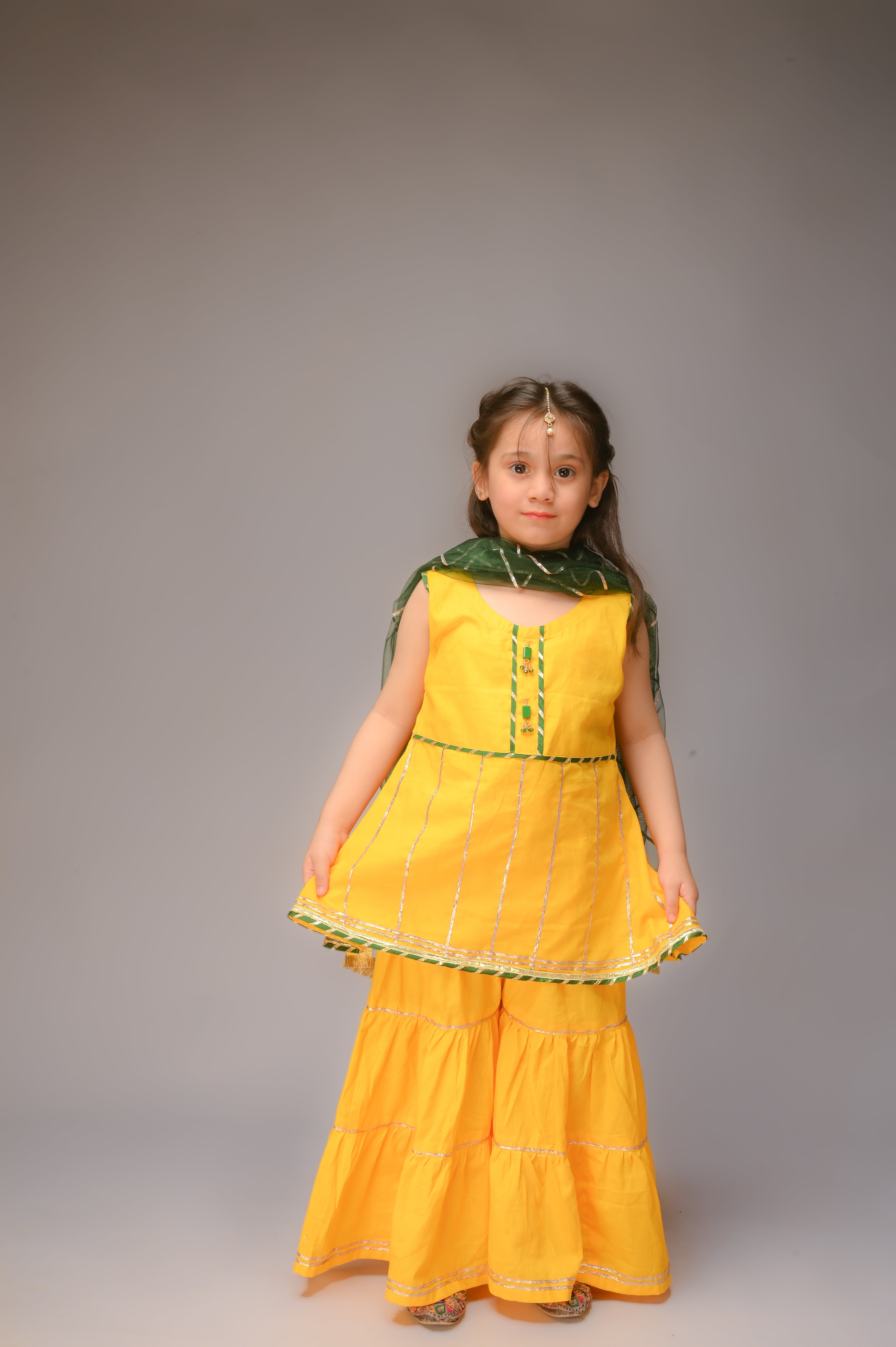 3 piece Yellow Cotton Sleeveless Gharara Suit with Bottle Green net Dupatta & Bottle Green & Golden Laces.(Stitch)