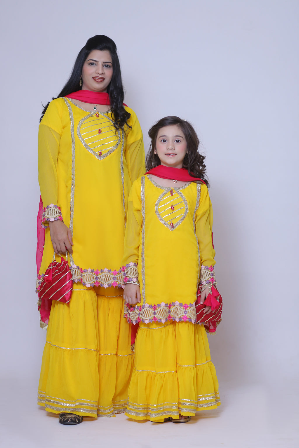 3 piece Beautiful Stunning Yellow Chiffon Gharara Suit with Shocking Pink Chiffon Dupatta & multicolor Laces.(Stitch)