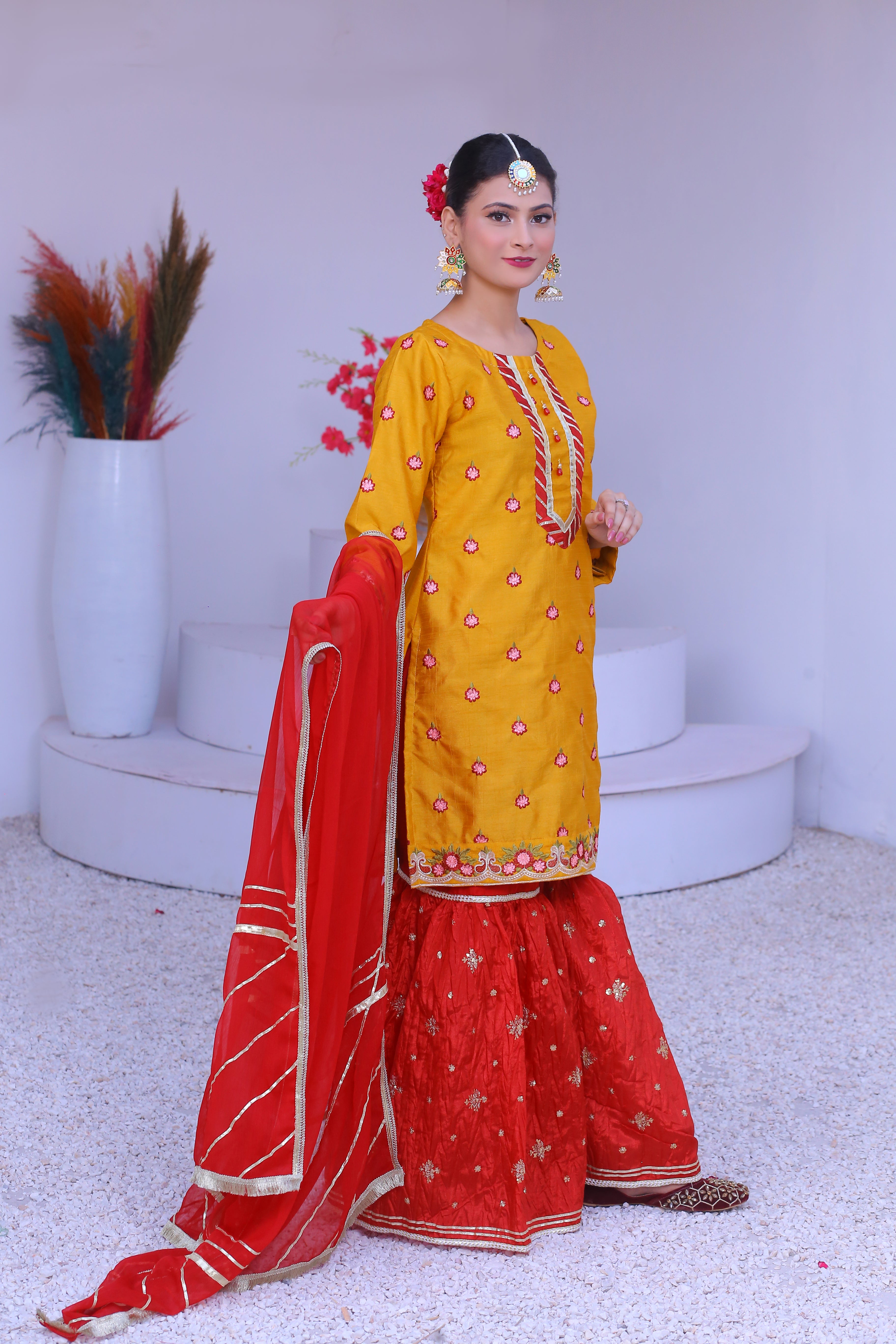 3 piece Mustered Embroidery Raw Silk Gharara Suit with Reddish Maroon Crush Embroidery Gharara & Reddish Maroon Chiffon Dupatta & Laces.(Stitch)