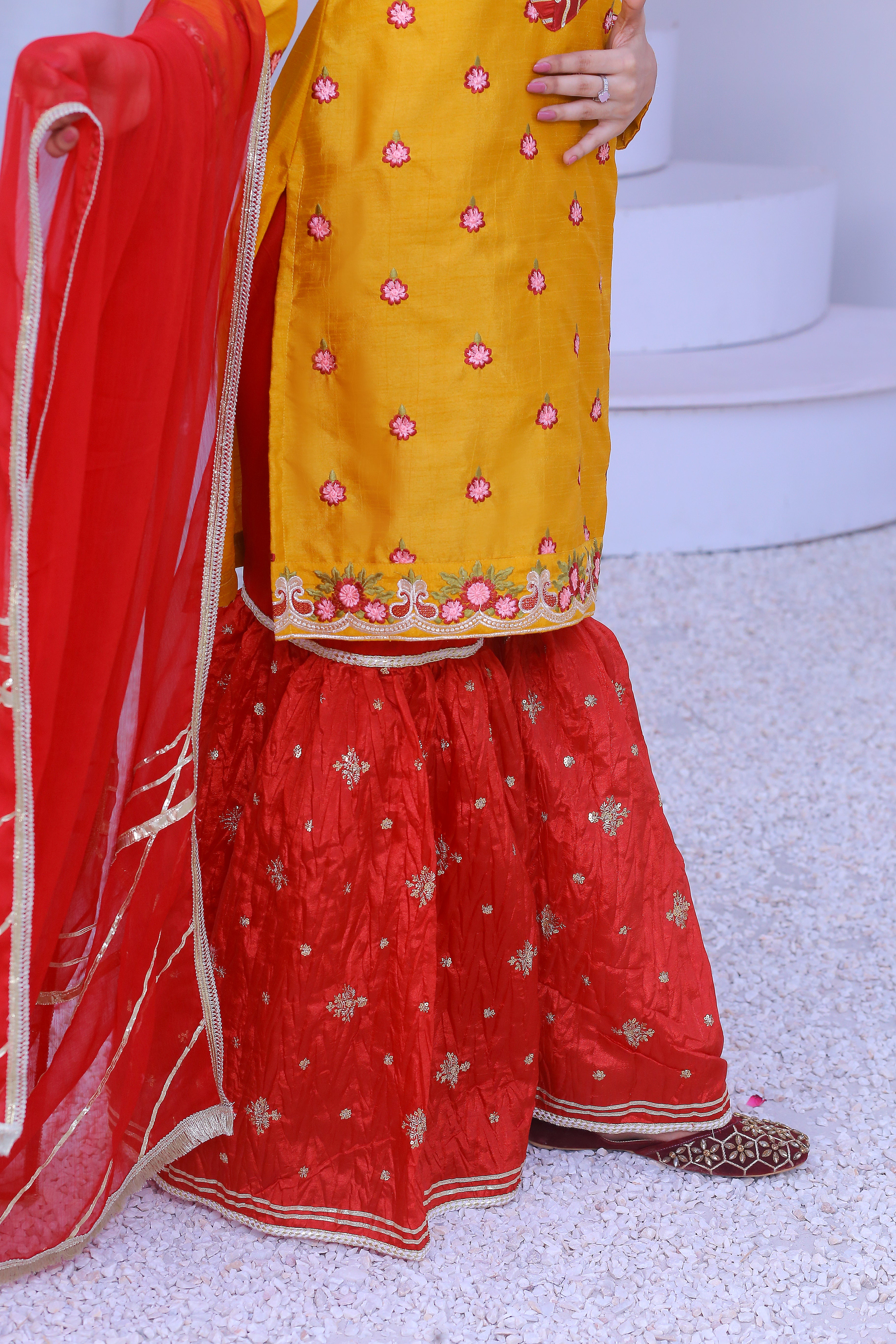 3 piece Mustered Embroidery Raw Silk Gharara Suit with Reddish Maroon Crush Embroidery Gharara & Reddish Maroon Chiffon Dupatta & Laces.(Stitch)