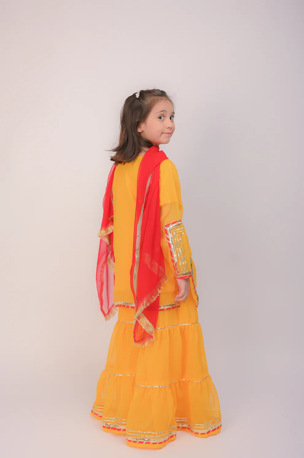 3 piece Yellow Chiffon Gharara Suit with Red Chiffon Dupatta with Laces.(Stitch).